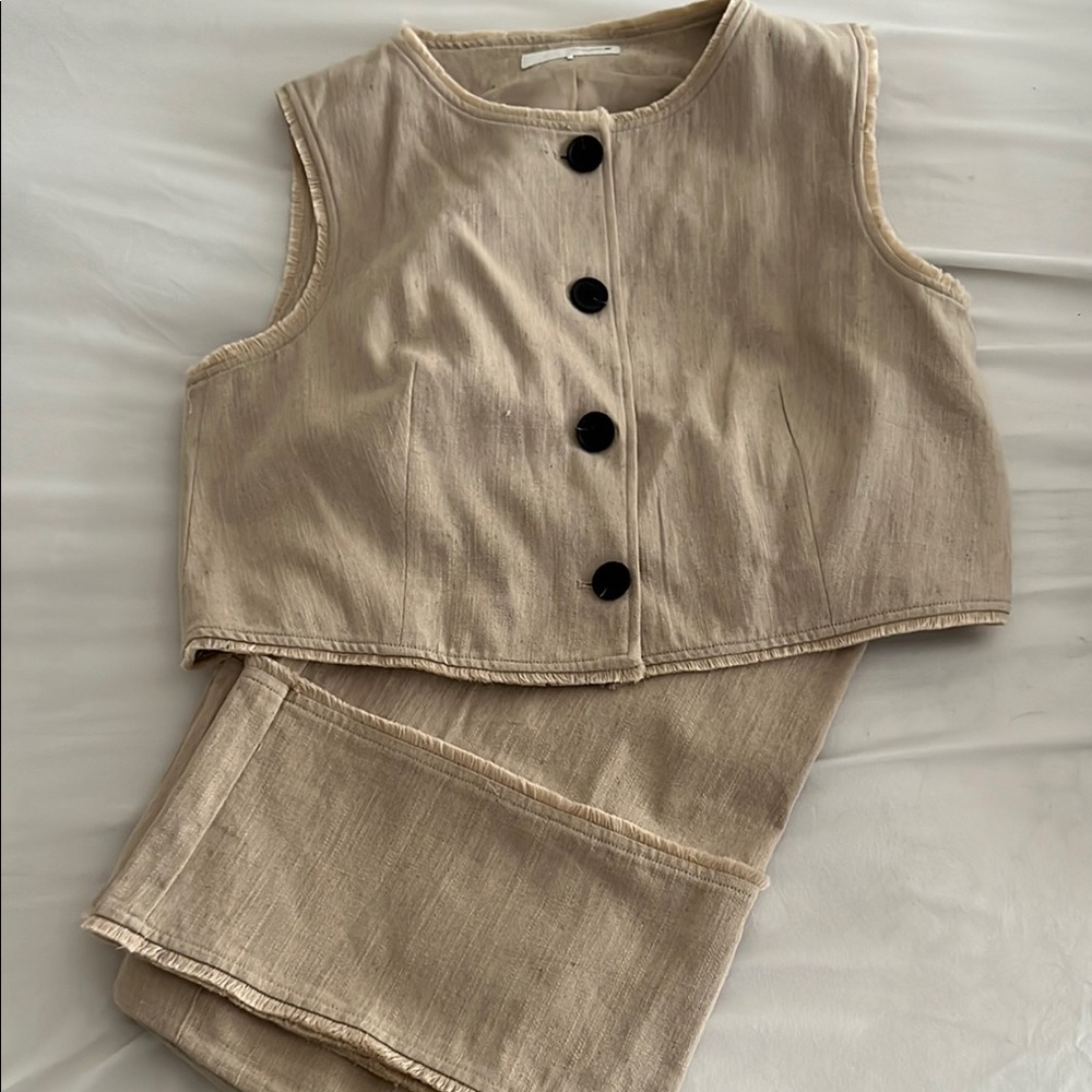 Zara Beige Sleeveless Blouse with Black Buttons
